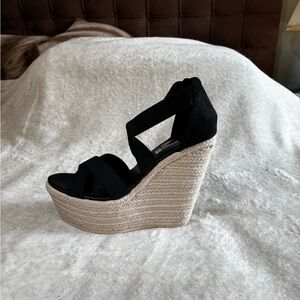 Elegant Black Wedge Sandals with Woven Platform